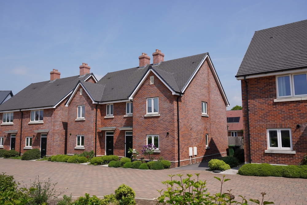New,Housing,Estate,In,Suburban,Uk,Town.,New,Build,Houses